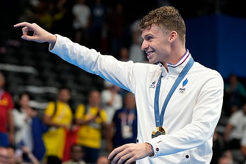 200-meter breaststroke gold winner Leon Marchand